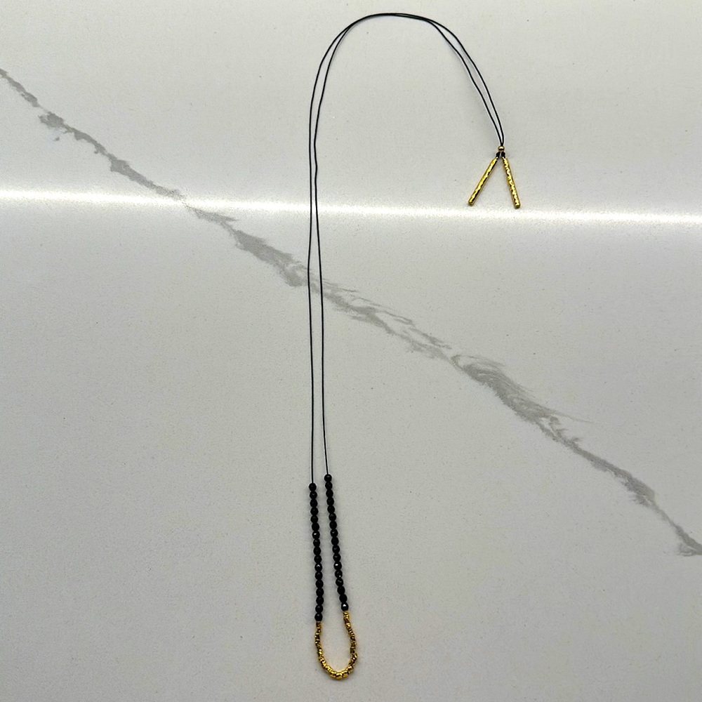 Black and gold necklace great condition 16 inches long